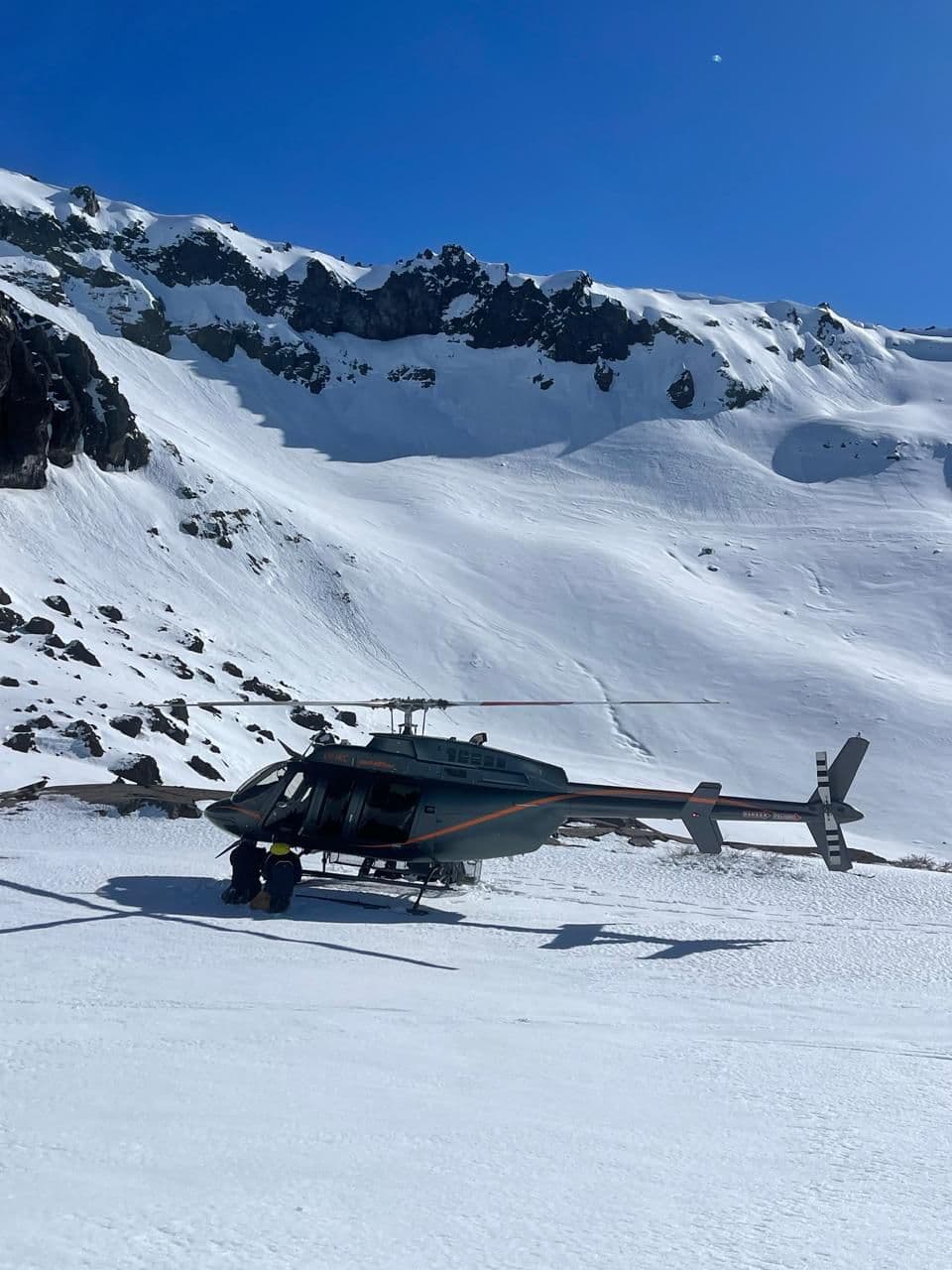 Heli skiing and snowmobile touring at Lodge Tikilen, Caviahue